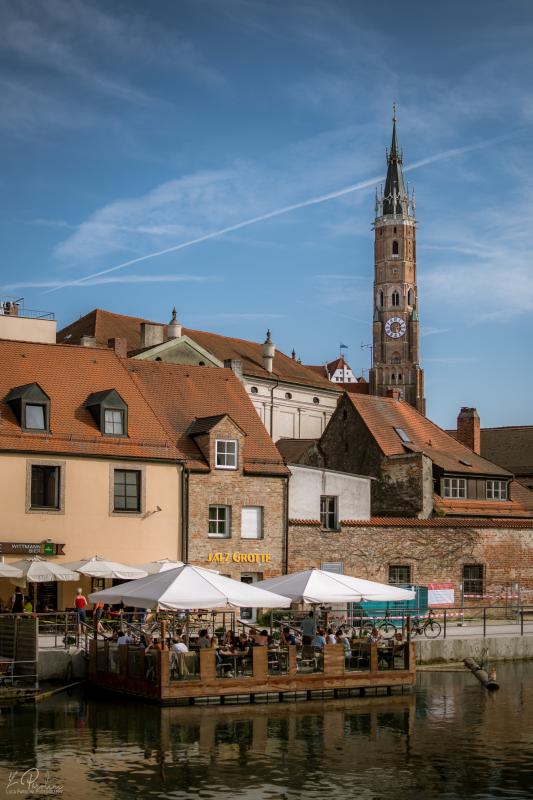 Old town of Landshut from the Isar river. View of the St. Martin on the background