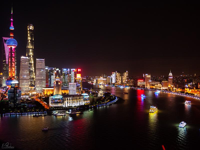 Huangpu River, Shanghai Tower, the Oriental Pearl Tower, and the Shanghai World Financial Center at night