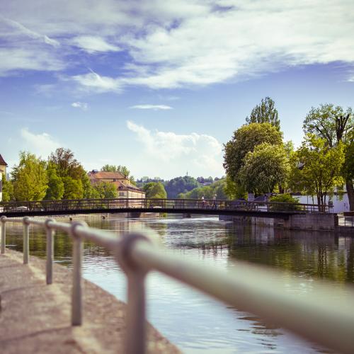 Bank of the Isar river in the old town of Landshut, Bayern