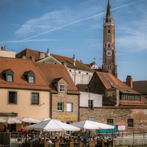 Old town of Landshut from the Isar river. View of the St. Martin on the background